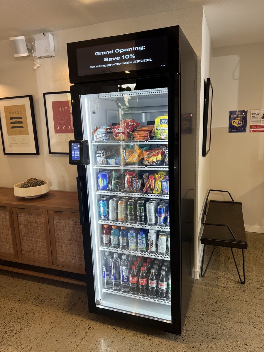 A Tap and Take smart cooler in a San Diego building lobby